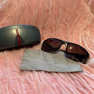 Prada Lina Rossa sunglasses and case. Great condition!
